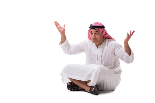 Young arab man sitting isolated on white — Stock Photo, Image