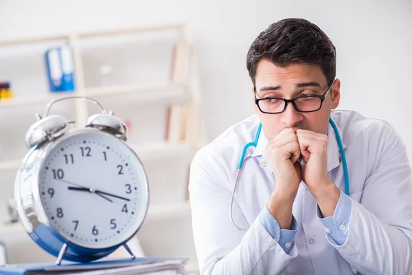 Doctor with alarm clock in urgent check-up concept — Stock Photo, Image