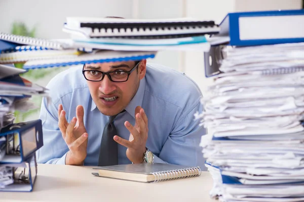 Extremely busy businessman working in office — Stock Photo, Image