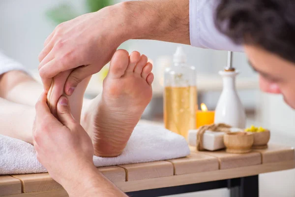 Foot massage in medical spa — Stock Photo, Image