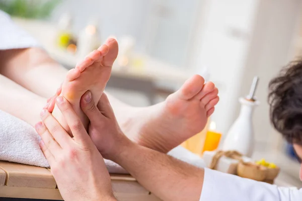 Foot massage in medical spa — Stock Photo, Image