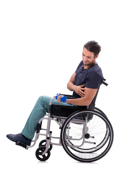 Joven hombre discapacitado haciendo ejercicios físicos aislados en blanco — Foto de Stock