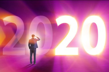 Businessman and concept of new year 2020 clipart