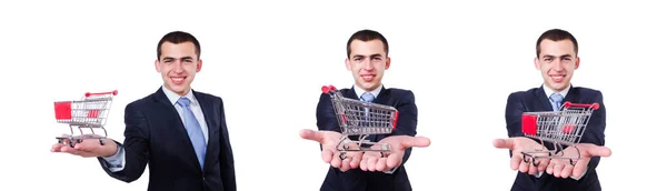 Businessman with shopping cart on white — Stock Photo, Image