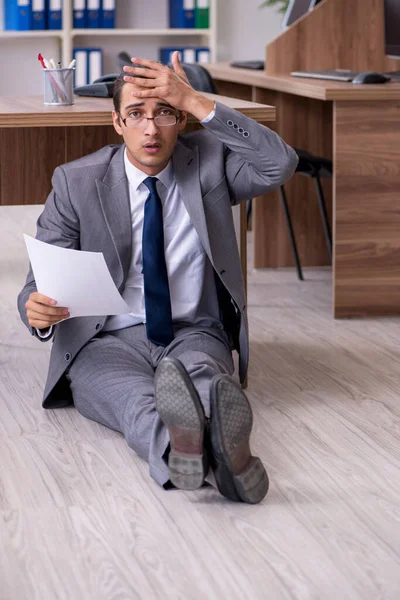 Unhappy male businessman in the office