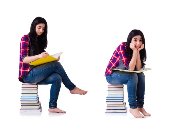 Junge Studentin mit Büchern auf Weiß — Stockfoto