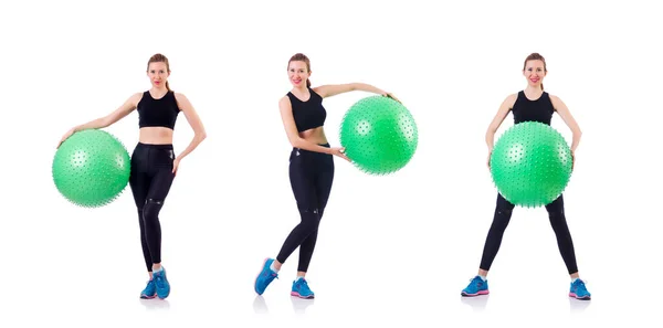 Young woman with ball exercising on white — Stock Photo, Image