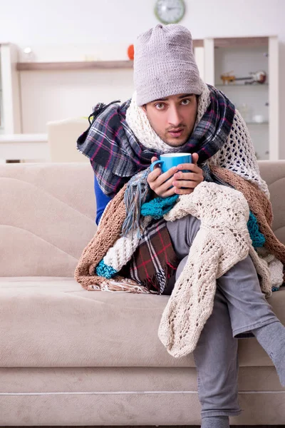 Young man suffering at home — Stock Photo, Image