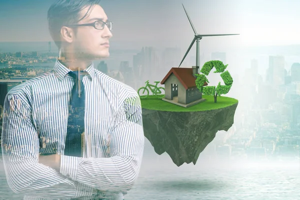 Green energy anc ecology concept with businessman — Stock Photo, Image