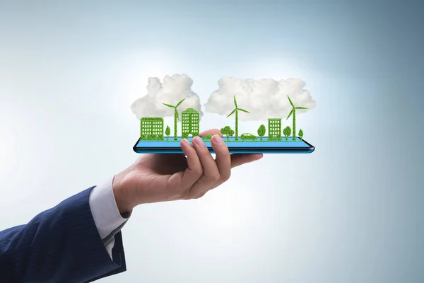 Hand holding tablet with mini ecosystem and clean energy — Stock Photo, Image