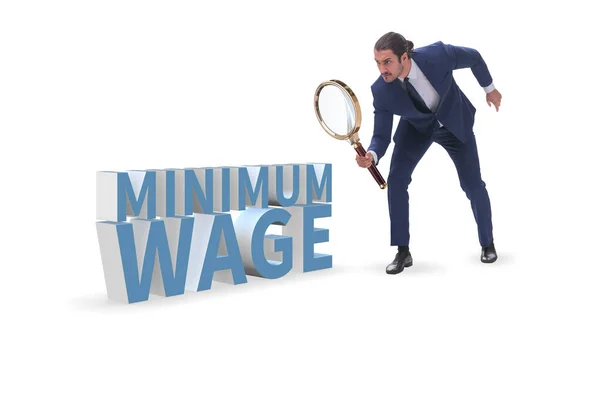 Концепция минимальной заработной платы с предпринимателем — стоковое фото