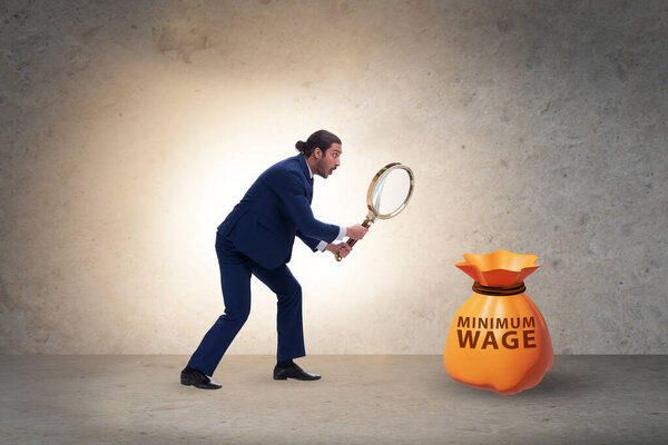 Concept of minimum wage with businessman