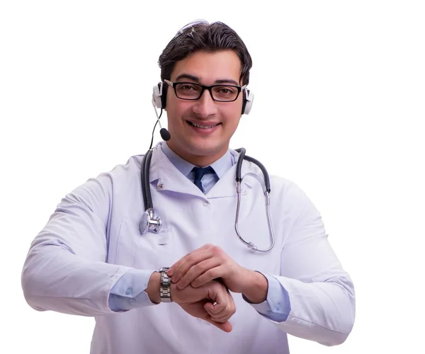 Médico jovem com fone de ouvido isolado em branco — Fotografia de Stock