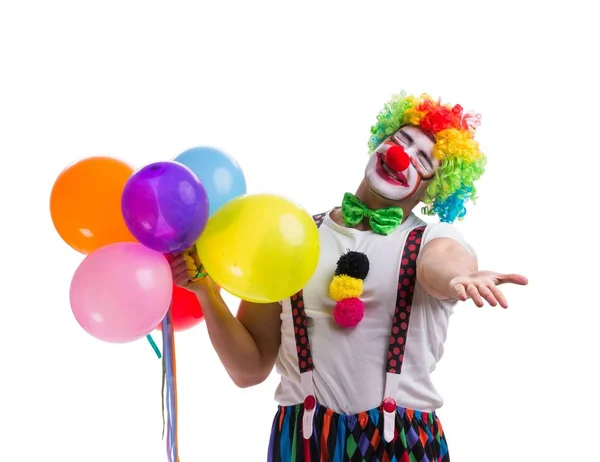 Grappige clown met ballonnen geïsoleerd op witte achtergrond — Stockfoto