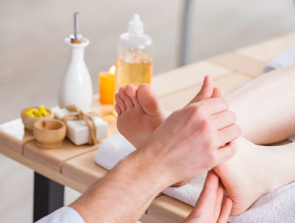 Foot massage in medical spa — Stock Photo, Image