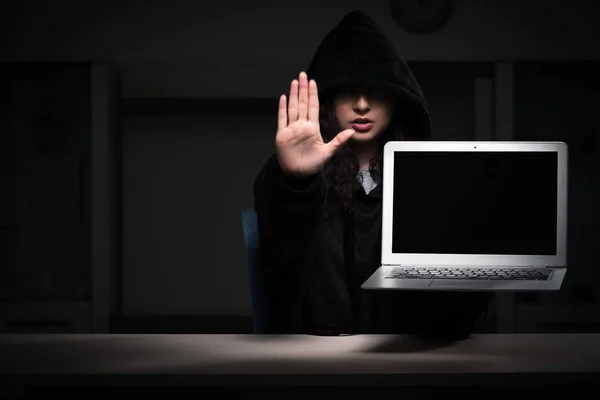 Female hacker hacking security firewall late in office — Stock Photo, Image