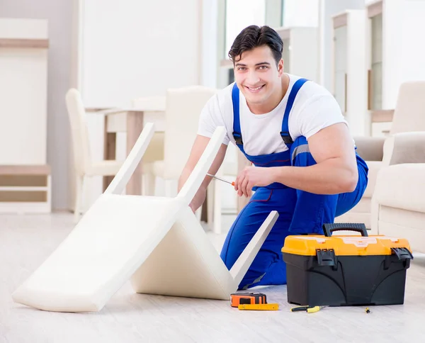Furniture repairman working in store — Stock Photo, Image