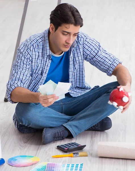 The young man overspending his budget in refurbishment project — Stock Photo, Image