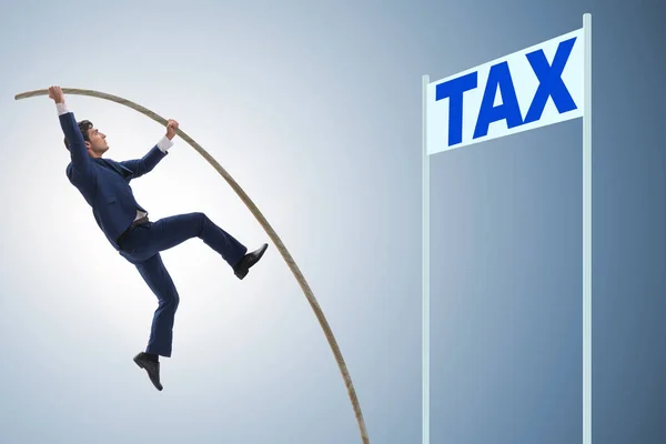 The businessman jumping over tax in tax evasion avoidance concep