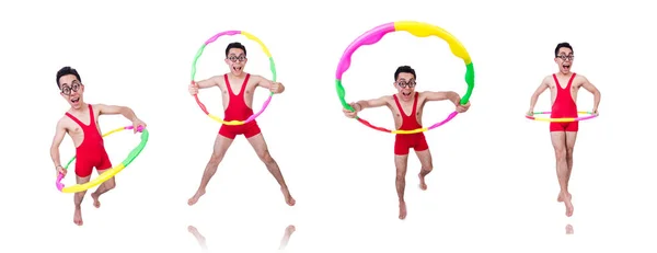 Lustiger Sportler mit Hula-Hoop-Reifen auf Weiß — Stockfoto