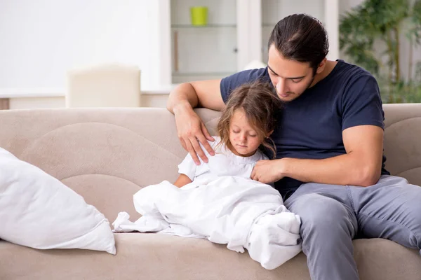 Father taking care of his ill daughter — Stock Photo, Image