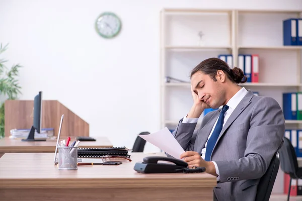 Unhappy male businessman in the office — Stock Photo, Image