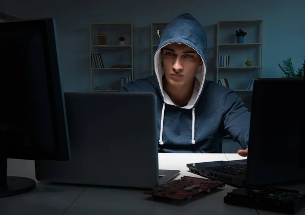 Hacker hacking computer at night — Stock Photo, Image