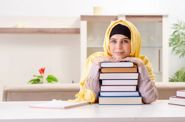 Female student in hijab preparing for exams — Stock Photo, Image