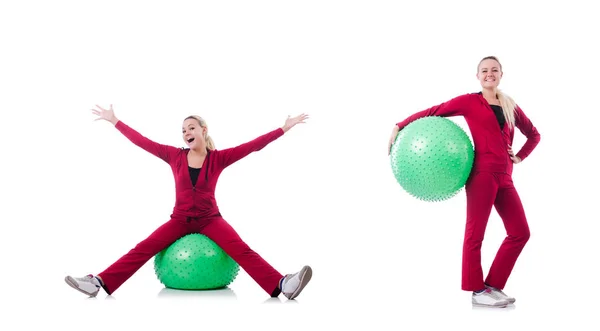 Young woman with ball exercising on whitee — Stock Photo, Image