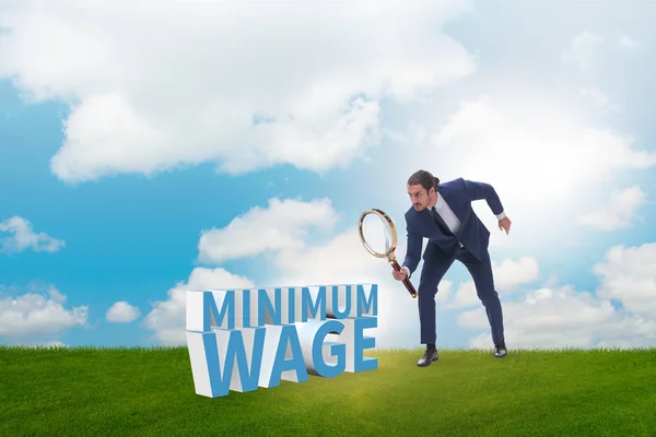 Concept of minimum wage with businessman — Stock Photo, Image