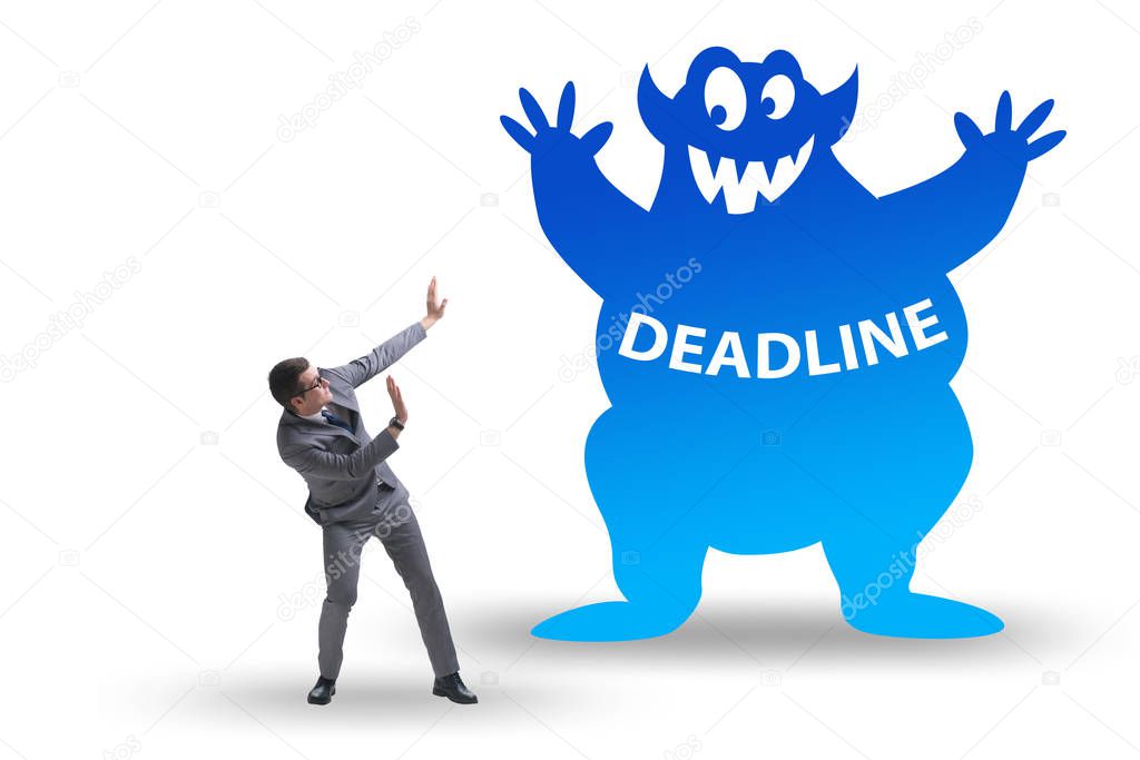 Businessman missing important deadline with monster