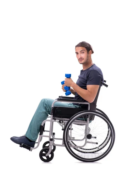 Young disabled man doing physical exercises isolated on white — Stock Photo, Image