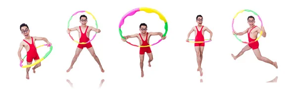 Lustiger Sportler mit Hula-Hoop-Reifen auf Weiß — Stockfoto