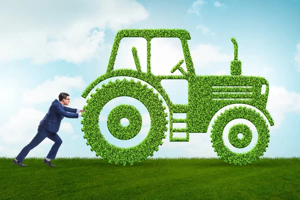 Zakenman met groen ecologisch voertuig — Stockfoto