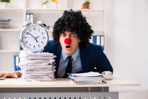 Young clown businessman working in the office — Stock Photo, Image