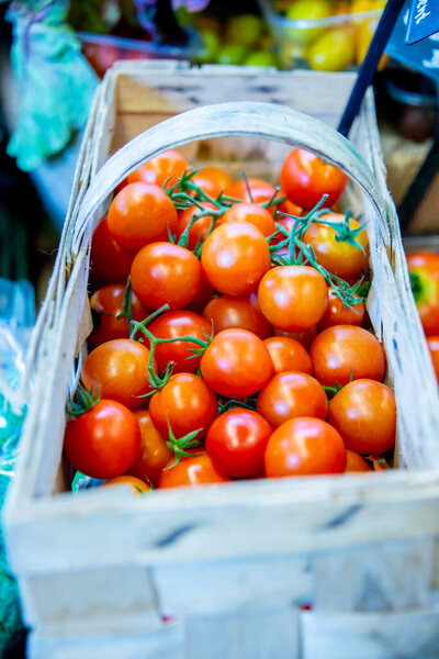 Tomatoes at the market display stall