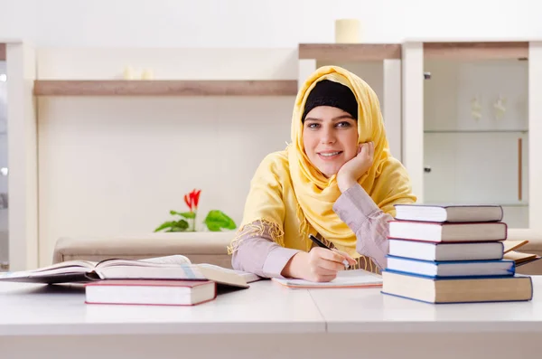 Female student in hijab preparing for exams — Stock Photo, Image