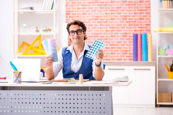 Young designer freelancer working on new project — Stock Photo, Image