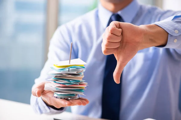 Young male employee in budget planning concept — Stock Photo, Image