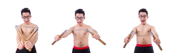 Divertente ragazzo con nunchaku su bianco — Foto Stock