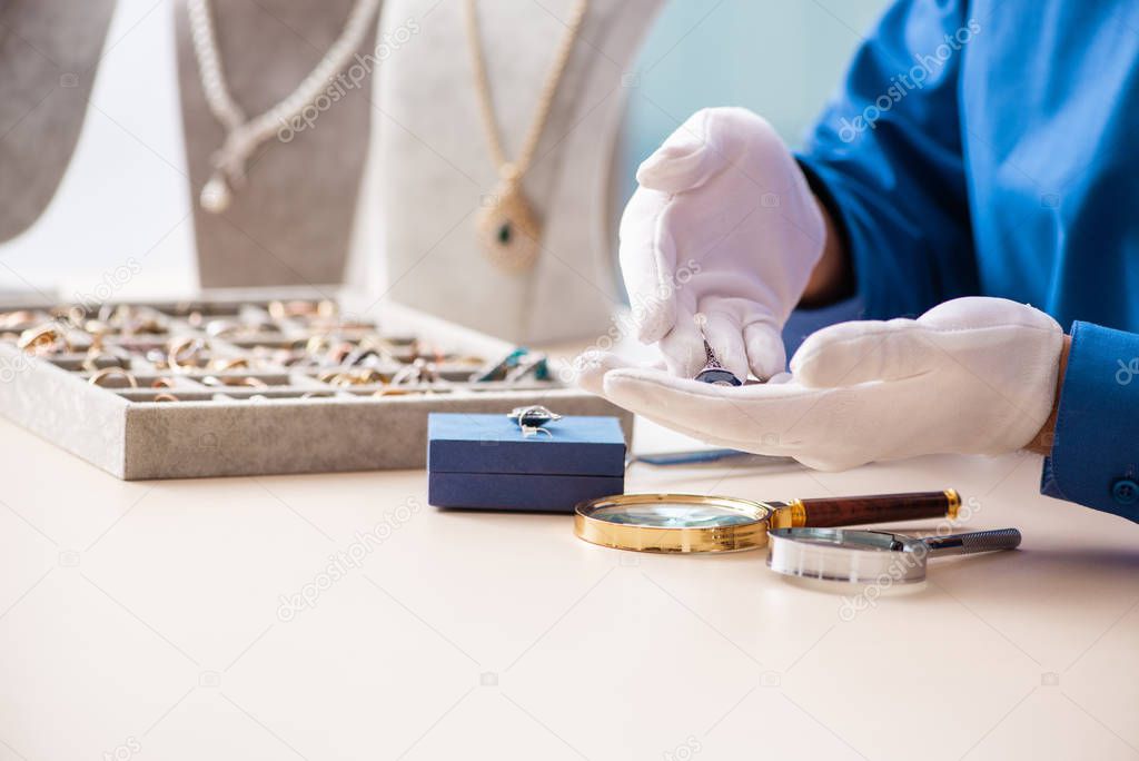 Young jeweler working in his workshop