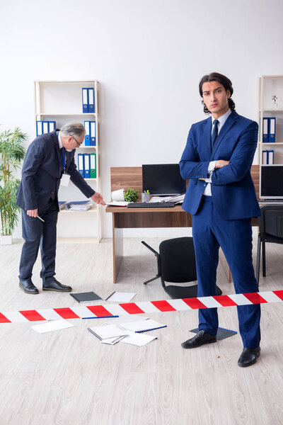 Two experts criminologists working in the office