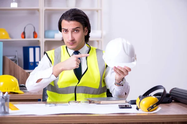 Young male architect working in the office — Stock Photo, Image