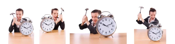 Woman trying to break the clock — Stock Photo, Image