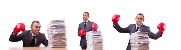 Angry businessman with stack of papers — Stock Photo, Image