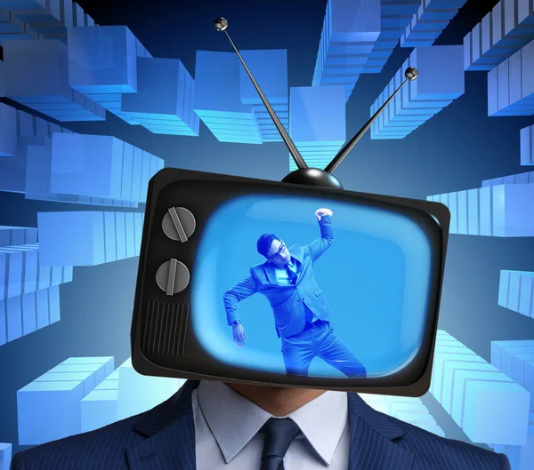 Man with television head in tv addiction concept