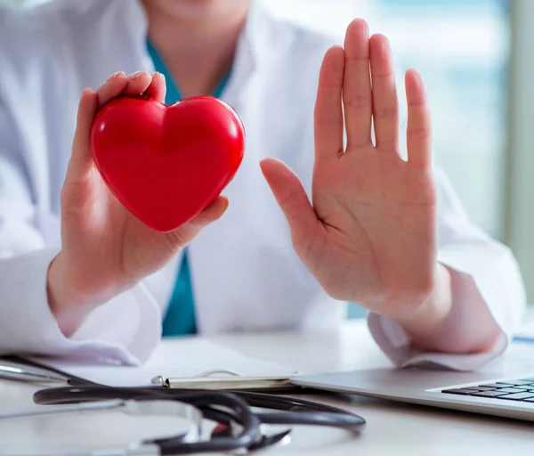 Doctor checking up heart in medical concept — Stock Photo, Image