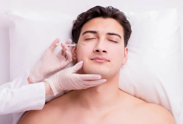 Handsome man in spa massage concept — Stock Photo, Image