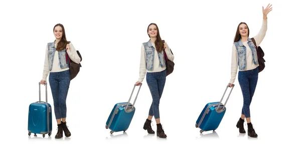 Smiling caucasian girl walking with suitcase isolated on white — Stock Photo, Image