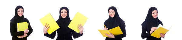 Young muslim woman with book on white — Stock Photo, Image